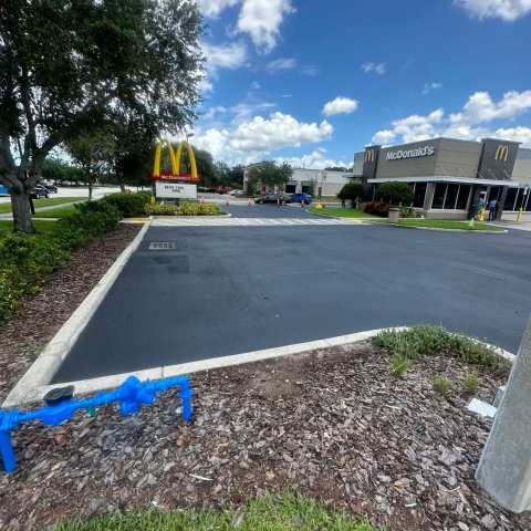 Newly paved commercial parking lot, project photo 23