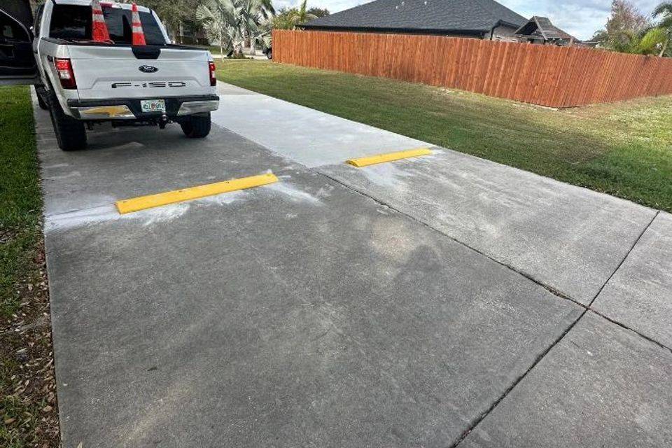 Yellow speed bump installed by All Brevard Asphalt, photo 3